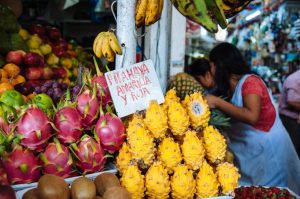 Vibrant produce on display at the Surquillo Market in Lima, Peru