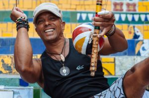 A local gentleman plays a berimbau on the Escadaria Selarón