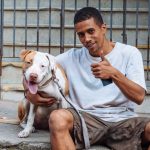 A man out walking his dog in Lapa