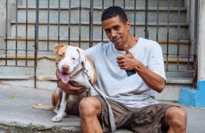 A man out walking his dog in Lapa