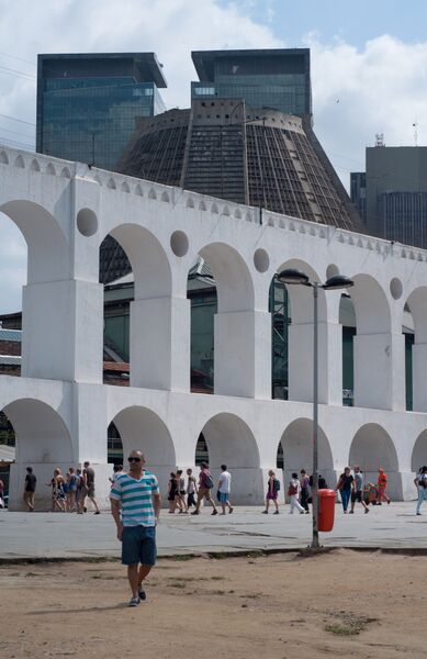 The Carioca Aqueduct in front of the Metropolitan Cathedral of Rio de Janeiro, two highly contrasting styles in Lapa