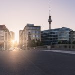 Titel: Fernsehturm And Buildings Against Clear Sky During Sunset